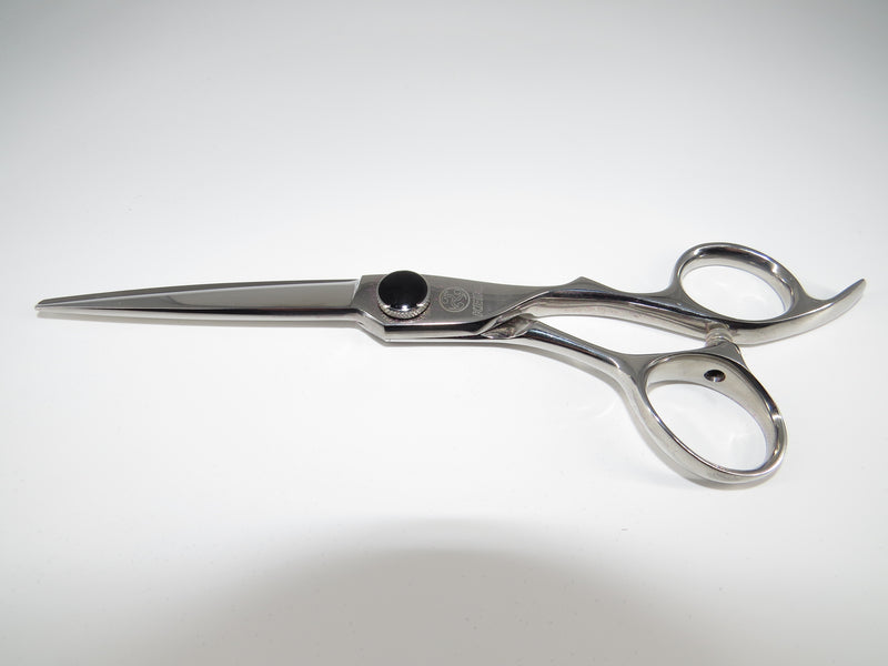 As a hairstylist, what other things should I consider when buying a new shear?